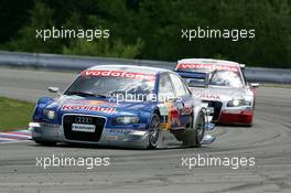 05.06.2005 Brno, Czech Republic,  Mattias Ekström (SWE), Audi Sport Team Abt Sportsline, Audi A4 DTM, leads Tom Kristensen (DNK), Audi Sport Team Abt, Audi A4 DTM - DTM 2005 at Automotodrom Brno, Czech Republic (Deutsche Tourenwagen Masters)