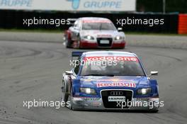 05.06.2005 Brno, Czech Republic,  Mattias Ekström (SWE), Audi Sport Team Abt Sportsline, Audi A4 DTM, leads the race in front of Tom Kristensen (DNK), Audi Sport Team Abt, Audi A4 DTM - DTM 2005 at Automotodrom Brno, Czech Republic (Deutsche Tourenwagen Masters)