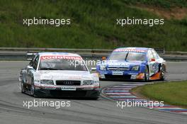 05.06.2005 Brno, Czech Republic,  Pierre Kaffer (GER), Audi Sport Team Joest Racing, Audi A4 DTM, leads Manuel Reuter (GER), Opel Performance Center, Opel Vectra GTS V8 - DTM 2005 at Automotodrom Brno, Czech Republic (Deutsche Tourenwagen Masters)