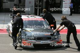 30.04.2005 Klettwitz, Germany,  Audi mechanics push the car of Christian Abt (GER), Audi Sport Team Joest Racing, Audi A4 DTM, back into the pitbox - DTM 2005 at Eurospeedway Lausitzring (Deutsche Tourenwagen Masters)