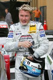 30.04.2005 Klettwitz, Germany,  A happy Mika Häkkinen (FIN), Sport Edition AMG-Mercedes, AMG-Mercedes C-Klasse, who secured a 3rd place in the Super Pole qualifying in only his 2nd DTM race - DTM 2005 at Eurospeedway Lausitzring (Deutsche Tourenwagen Masters)