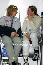 30.04.2005 Klettwitz, Germany,  Tina Thörner (SWE), girlfriend of Mattias Ekström (SWE) (left) and Christina Surer (AUT), girlfriend of Christian Abt (GER) (right), having some fun - DTM 2005 at Eurospeedway Lausitzring (Deutsche Tourenwagen Masters)