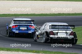 01.05.2005 Klettwitz, Germany,  Fight for position between Martin Tomczyk (GER), Audi Sport Team Abt Sportsline, Audi A4 DTM and Jean Alesi (FRA), AMG-Mercedes, AMG-Mercedes C-Klasse - DTM 2005 at Eurospeedway Lausitzring (Deutsche Tourenwagen Masters)