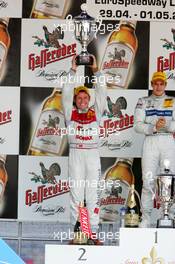 01.05.2005 Klettwitz, Germany,  Podium, Tom Kristensen (DNK), Audi Sport Team Abt, Portrait, holding up the trophy for 2nd place - DTM 2005 at Eurospeedway Lausitzring (Deutsche Tourenwagen Masters)