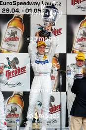 01.05.2005 Klettwitz, Germany,  Podium, Gary Paffett (GBR), DaimlerChrysler Bank AMG-Mercedes, Portrait, holding up the winners trophy - DTM 2005 at Eurospeedway Lausitzring (Deutsche Tourenwagen Masters)