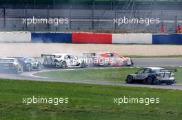 01.05.2005 Klettwitz, Germany,  Alexandros Margaritis (GRC), Mücke Motorsport, AMG-Mercedes C-Klasse, with a smoking tyre due to bodywork touching the tyre - DTM 2005 at Eurospeedway Lausitzring (Deutsche Tourenwagen Masters)
