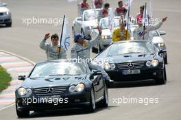 01.05.2005 Klettwitz, Germany,  Driver parade, with Bruno Spengler (CDN), Junge Gebrauchte von Mercedes and Jean Alesi (FRA), AMG-Mercedes - DTM 2005 at Eurospeedway Lausitzring (Deutsche Tourenwagen Masters)