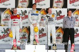 01.05.2005 Klettwitz, Germany,  Podium, Gary Paffett (GBR), DaimlerChrysler Bank AMG-Mercedes, Portrait (1st, center), Tom Kristensen (DNK), Audi Sport Team Abt, Portrait (2nd, left) and Mika Häkkinen (FIN), Sport Edition AMG-Mercedes, Portrait (3rd, right) - DTM 2005 at Eurospeedway Lausitzring (Deutsche Tourenwagen Masters)