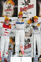 01.05.2005 Klettwitz, Germany,  Podium, Gary Paffett (GBR), DaimlerChrysler Bank AMG-Mercedes, Portrait (1st, center), Tom Kristensen (DNK), Audi Sport Team Abt, Portrait (2nd, left) and Mika Häkkinen (FIN), Sport Edition AMG-Mercedes, Portrait (3rd, right) - DTM 2005 at Eurospeedway Lausitzring (Deutsche Tourenwagen Masters)