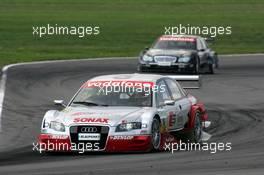 01.05.2005 Klettwitz, Germany,  Tom Kristensen (DNK), Audi Sport Team Abt, Audi A4 DTM (2nd), in front of Mika Häkkinen (FIN), Sport Edition AMG-Mercedes, AMG-Mercedes C-Klasse (3rd) - DTM 2005 at Eurospeedway Lausitzring (Deutsche Tourenwagen Masters)