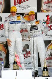 01.05.2005 Klettwitz, Germany,  Podium, Gary Paffett (GBR), DaimlerChrysler Bank AMG-Mercedes, Portrait (1st, left) and Mika Häkkinen (FIN), Sport Edition AMG-Mercedes, Portrait (2nd, right) - DTM 2005 at Eurospeedway Lausitzring (Deutsche Tourenwagen Masters)