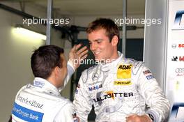17.09.2005 Klettwitz, Germany,  Gary Paffett (GBR), DaimlerChrysler Bank AMG-Mercedes, Portrait (left), congratulates Jamie Green (GBR), Salzgitter AMG-Mercedes, Portrait (right), with his pole position - DTM 2005 at Lausitzring (Deutsche Tourenwagen Masters)