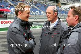 17.09.2005 Klettwitz, Germany,  Mattias Ekström (SWE), Audi Sport Team Abt Sportsline, Portrait, chatting with Dr. Wolfgang Ullrich (GER), Audi's Head of Sport - DTM 2005 at Lausitzring (Deutsche Tourenwagen Masters)