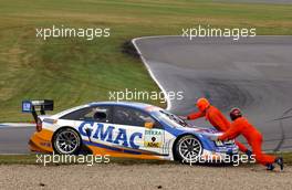 17.09.2005 Klettwitz, Germany,  Marshalls push Marcel Fässler (SUI), Opel Performance Center, Opel Vectra GTS V8, out of the gravel after a small spin - DTM 2005 at Lausitzring (Deutsche Tourenwagen Masters)