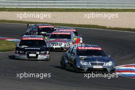 18.09.2005 Klettwitz, Germany,  Jean Alesi (FRA), AMG-Mercedes, AMG-Mercedes C-Klasse, leads Allan McNish (GBR), Audi Sport Team Abt, Audi A4 DTM and Bernd Schneider (GER), Vodafone AMG-Mercedes, AMG-Mercedes C-Klasse - DTM 2005 at Lausitzring (Deutsche Tourenwagen Masters)