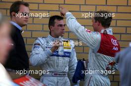 18.09.2005 Klettwitz, Germany,  Gary Paffett (GBR), DaimlerChrysler Bank AMG-Mercedes, Portrait (2nd, left) and Mattias Ekström (SWE), Audi Sport Team Abt Sportsline, Portrait (1st, right), chatting after the race - DTM 2005 at Lausitzring (Deutsche Tourenwagen Masters)