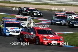 18.09.2005 Klettwitz, Germany,  Start of the race, with Heinz-Harald Frentzen (GER), Opel Performance Center, Opel Vectra GTS V8, leading the field through the first corners - DTM 2005 at Lausitzring (Deutsche Tourenwagen Masters)
