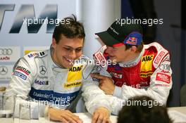 16.04.2005 Hockenheim, Germany,  Press conference, Mattias Ekström (SWE), Audi Sport Team Abt Sportsline, Portrait (1st, right), having some fun with Gary Paffett (GBR), DaimlerChrysler Bank AMG-Mercedes, Portrait (2nd, left) - DTM 2005 at Hockenheimring Baden-Württemberg (Deutsche Tourenwagen Masters)