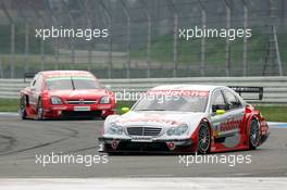 17.04.2005 Hockenheim, Germany,  Bernd Schneider (GER), Vodafone AMG-Mercedes, AMG-Mercedes C-Klasse, in front of Heinz-Harald Frentzen (GER), Opel Performance Center, Opel Vectra GTS V8 - DTM 2005 at Hockenheimring Baden-Württemberg (Deutsche Tourenwagen Masters)