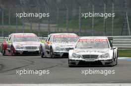 17.04.2005 Hockenheim, Germany,  Jean Alesi (FRA), AMG-Mercedes, AMG-Mercedes C-Klasse, in front of Jamie Green (GBR), Salzgitter AMG-Mercedes, AMG-Mercedes C-Klasse and Bernd Schneider (GER), Vodafone AMG-Mercedes, AMG-Mercedes C-Klasse - DTM 2005 at Hockenheimring Baden-Württemberg (Deutsche Tourenwagen Masters)