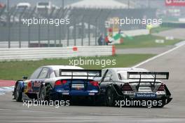 17.04.2005 Hockenheim, Germany,  Mattias Ekström (SWE), Audi Sport Team Abt Sportsline, Audi A4 DTM (left) and Gary Paffett (GBR), DaimlerChrysler Bank AMG-Mercedes, AMG-Mercedes C-Klasse (right), fight for position - DTM 2005 at Hockenheimring Baden-Württemberg (Deutsche Tourenwagen Masters)