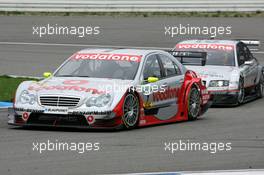 17.04.2005 Hockenheim, Germany,  Bernd Schneider (GER), Vodafone AMG-Mercedes, AMG-Mercedes C-Klasse, in front of Frank Stippler (GER), Audi Sport Team Joest, Audi A4 DTM - DTM 2005 at Hockenheimring Baden-Württemberg (Deutsche Tourenwagen Masters)