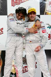 17.04.2005 Hockenheim, Germany,  Podium, Jean Alesi (FRA), AMG-Mercedes, Portrait (1st, left) and Bernd Schneider (GER), Vodafone AMG-Mercedes, Portrait (2nd, left) - DTM 2005 at Hockenheimring Baden-Württemberg (Deutsche Tourenwagen Masters)