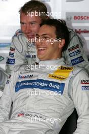 22.10.2005 Hockenheim, Germany,  Gary Paffett (GBR), DaimlerChrysler Bank AMG-Mercedes, Portrait (front) and Mika Häkkinen (FIN), Sport Edition AMG-Mercedes, Portrait (rear) - DTM 2005 at Hockenheimring (Deutsche Tourenwagen Masters)