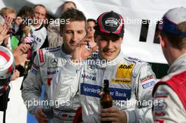 23.10.2005 Hockenheim, Germany,  Mattias Ekström (SWE), Audi Sport Team Abt Sportsline, comes to congratulate Gary Paffett (GBR), DaimlerChrysler Bank AMG-Mercedes, Portrait, with the 2005 DTM championship - DTM 2005 at Hockenheimring (Deutsche Tourenwagen Masters)