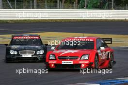23.10.2005 Hockenheim, Germany,  Heinz-Harald Frentzen (GER), Opel Performance Center, Opel Vectra GTS V8, fighting for position with Mika Häkkinen (FIN), Sport Edition AMG-Mercedes, AMG-Mercedes C-Klasse - DTM 2005 at Hockenheimring (Deutsche Tourenwagen Masters)