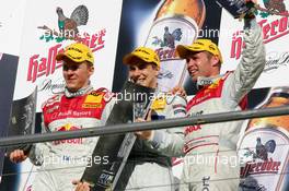 23.10.2005 Hockenheim, Germany,  Podium, the Top 3 of the 2005 DTM Championship, Gary Paffett (GBR), DaimlerChrysler Bank AMG-Mercedes, Portrait (1st, center), Mattias Ekström (SWE), Audi Sport Team Abt Sportsline, Portrait (2nd, left) and Tom Kristensen (DNK), Audi Sport Team Abt, Portrait (3rd, right) - DTM 2005 at Hockenheimring (Deutsche Tourenwagen Masters)