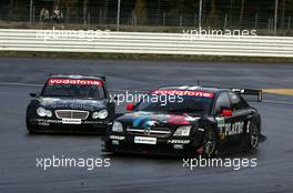 23.10.2005 Hockenheim, Germany,  Laurent Aiello (FRA), Opel Performance Center, Opel Vectra GTS V8, leads Mika Häkkinen (FIN), Sport Edition AMG-Mercedes, AMG-Mercedes C-Klasse - DTM 2005 at Hockenheimring (Deutsche Tourenwagen Masters)