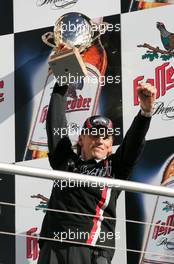 23.10.2005 Hockenheim, Germany,  Podium, Hans-Jürgen Mattheis (GER), Team Manager HWA, with the trophy for the winning constructor - DTM 2005 at Hockenheimring (Deutsche Tourenwagen Masters)