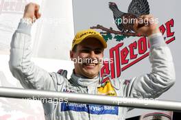 23.10.2005 Hockenheim, Germany,  Podium, Gary Paffett (GBR), DaimlerChrysler Bank AMG-Mercedes, Portrait (3rd) and the new 2005 DTM champion - DTM 2005 at Hockenheimring (Deutsche Tourenwagen Masters)