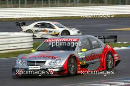 23.10.2005 Hockenheim, Germany,  Bernd Schneider (GER), Vodafone AMG-Mercedes, AMG-Mercedes C-Klasse, leads Jamie Green (GBR), Salzgitter AMG-Mercedes, AMG-Mercedes C-Klasse - DTM 2005 at Hockenheimring (Deutsche Tourenwagen Masters)