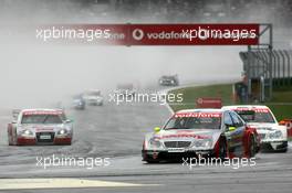 23.10.2005 Hockenheim, Germany,  Start of the race, with Bernd Schneider (GER), Vodafone AMG-Mercedes, AMG-Mercedes C-Klasse, leading Jamie Green (GBR), Salzgitter AMG-Mercedes, AMG-Mercedes C-Klasse and Tom Kristensen (DNK), Audi Sport Team Abt, Audi A4 DTM - DTM 2005 at Hockenheimring (Deutsche Tourenwagen Masters)