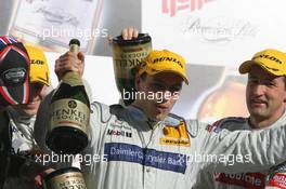 23.10.2005 Hockenheim, Germany,  Gary Paffett (GBR), DaimlerChrysler Bank AMG-Mercedes, AMG-Mercedes C-Klasse and Bernd Schneider (GER), Vodafone AMG-Mercedes, AMG-Mercedes C-Klasse- DTM 2005 at Hockenheimring Baden-Württemberg (Deutsche Tourenwagen Masters)