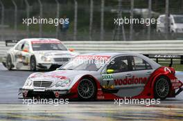 23.10.2005 Hockenheim, Germany,  Bernd Schneider (GER), Vodafone AMG-Mercedes, AMG-Mercedes C-Klasse, leads Jamie Green (GBR), Salzgitter AMG-Mercedes, AMG-Mercedes C-Klasse - DTM 2005 at Hockenheimring (Deutsche Tourenwagen Masters)