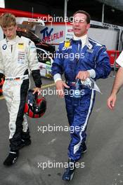15.07.2005 Nürnberg, Germany,  Johnny Cecotto (VEN), on the move to his next car. On his right side, his son Johnny Cecotto Jr. - DTM 2005 Race of the Legends at Norisring (Deutsche Tourenwagen Masters)