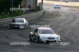 16.07.2005 Nürnberg, Germany,  Mick Doohan (AUS), AMG-Mercedes C-Klasse, in front of Jody Scheckter (RSA), Audi A4 DTM and Emerson Fittipaldi (BRA), Opel Vectra GTS V8 - DTM 2005 Race of the Legends at Norisring (Deutsche Tourenwagen Masters)