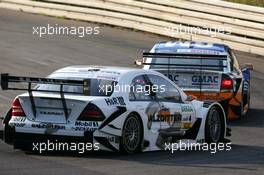 16.07.2005 Nürnberg, Germany,  Mick Doohan (AUS), AMG-Mercedes C-Klasse, following Alain Prost (FRA), Opel Vectra GTS V8 - DTM 2005 Race of the Legends at Norisring (Deutsche Tourenwagen Masters)