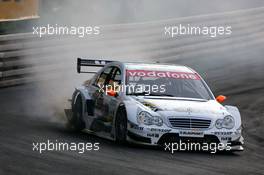 16.07.2005 Nürnberg, Germany,  Nigel Mansell (GBR), AMG-Mercedes C-Klasse, locking up the rear tyres under breaking - DTM 2005 Race of the Legends at Norisring (Deutsche Tourenwagen Masters)