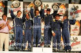 16.07.2005 Nürnberg, Germany,  Podium, from left to right: Jody Scheckter (RSA), Johnny Cecotto (VEN), Alain Prost (FRA) (1st), Nigel Mansell (GBR), Emerson Fittipaldi (BRA) and Mick Doohan (AUS) - DTM 2005 Race of the Legends at Norisring (Deutsche Tourenwagen Masters)
