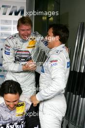 06.08.2005 Nürburg, Germany,  Mika Häkkinen (FIN), Sport Edition AMG-Mercedes, Portrait, congratulates Gary Paffett (GBR), DaimlerChrysler Bank AMG-Mercedes, Portrait, with his pole position - DTM 2005 at Nürburgring (Deutsche Tourenwagen Masters)