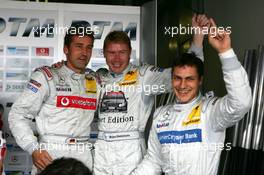 06.08.2005 Nürburg, Germany,  A succesfull qualifying for Mercedes with Bernd Schneider (GER), Vodafone AMG-Mercedes, Portrait, Mika Häkkinen (FIN), Sport Edition AMG-Mercedes, Portrait and Gary Paffett (GBR), DaimlerChrysler Bank AMG-Mercedes, Portrait - DTM 2005 at Nürburgring (Deutsche Tourenwagen Masters)