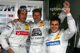 06.08.2005 Nürburg, Germany,  Bernd Schneider (GER), Vodafone AMG-Mercedes, Portrait and Mika Häkkinen (FIN), Sport Edition AMG-Mercedes, Portrait, congratulate Gary Paffett (GBR), DaimlerChrysler Bank AMG-Mercedes, AMG-Mercedes C-Klasse, with his pole position - DTM 2005 at Nürburgring (Deutsche Tourenwagen Masters)