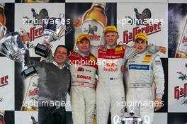 07.08.2005 Nürburg, Germany,  Podium, Mattias Ekström (SWE), Audi Sport Team Abt Sportsline, Portrait (1st, center), Tom Kristensen (DNK), Audi Sport Team Abt, Portrait (2nd, left) and Gary Paffett (GBR), DaimlerChrysler Bank AMG-Mercedes, Portrait (3rd, right) - DTM 2005 at Nürburgring (Deutsche Tourenwagen Masters)