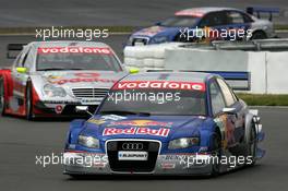 07.08.2005 Nürburg, Germany,  Mattias Ekström (SWE), Audi Sport Team Abt Sportsline, Audi A4 DTM, leads Bernd Schneider (GER), Vodafone AMG-Mercedes, AMG-Mercedes C-Klasse and Martin Tomczyk (GER), Audi Sport Team Abt Sportsline, Audi A4 DTM - DTM 2005 at Nürburgring (Deutsche Tourenwagen Masters)