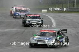 07.08.2005 Nürburg, Germany,  Gary Paffett (GBR), DaimlerChrysler Bank AMG-Mercedes, AMG-Mercedes C-Klasse. leads in front of Mika Häkkinen (FIN), Sport Edition AMG-Mercedes, AMG-Mercedes C-Klasse, Mattias Ekström (SWE), Audi Sport Team Abt Sportsline, Audi A4 DTM and Bernd Schneider (GER), Vodafone AMG-Mercedes, AMG-Mercedes C-Klasse - DTM 2005 at Nürburgring (Deutsche Tourenwagen Masters)