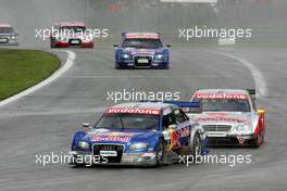 07.08.2005 Nürburg, Germany,  Mattias Ekström (SWE), Audi Sport Team Abt Sportsline, Audi A4 DTM, leads Bernd Schneider (GER), Vodafone AMG-Mercedes, AMG-Mercedes C-Klasse, Martin Tomczyk (GER), Audi Sport Team Abt Sportsline, Audi A4 DTM and Tom Kristensen (DNK), Audi Sport Team Abt, Audi A4 DTM - DTM 2005 at Nürburgring (Deutsche Tourenwagen Masters)